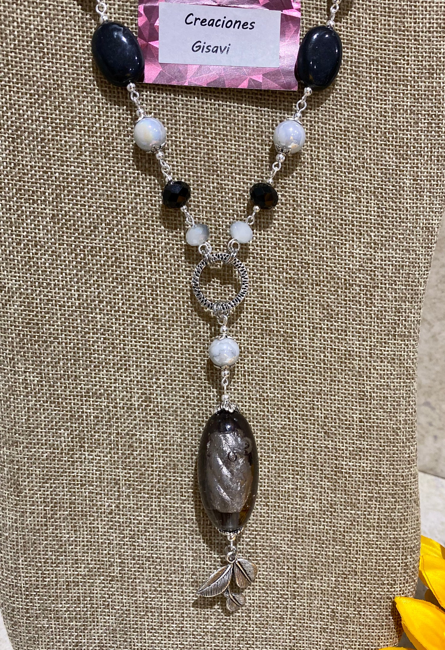 2028. Long necklace with gray and black crystals