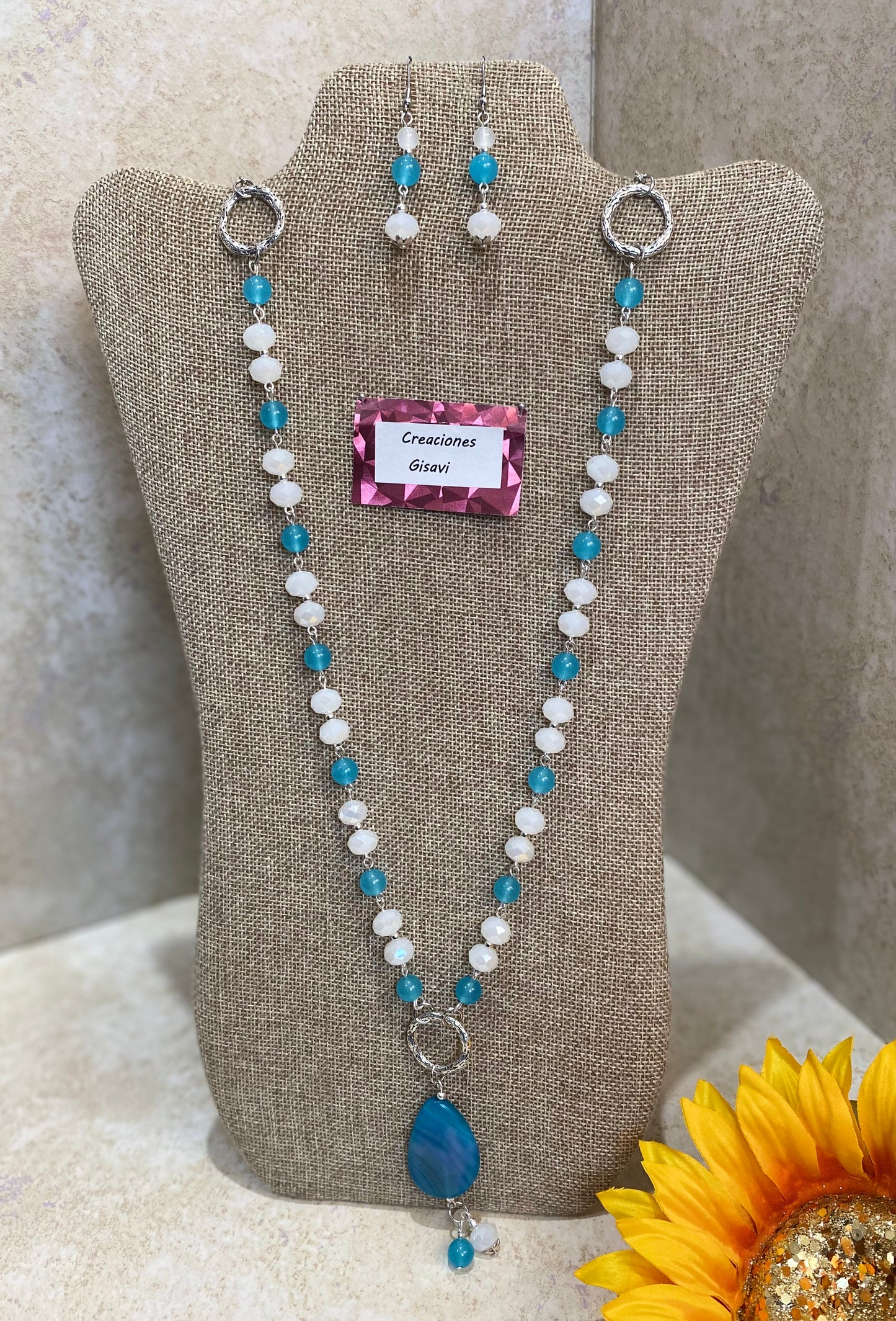 2013. Long necklace with turquoise jade and white crystals