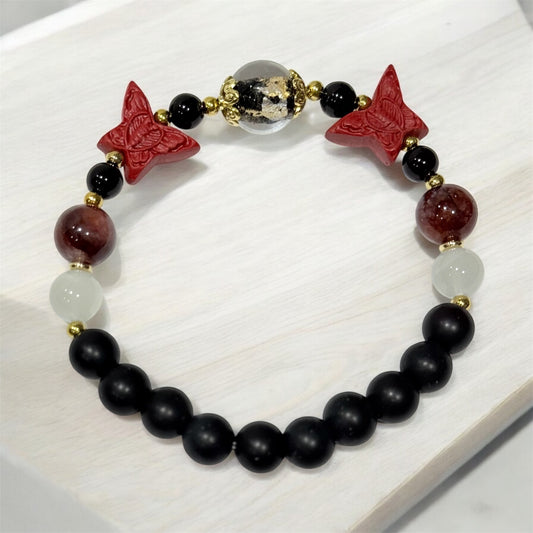 10 of 100 Bracelet with Moonstone, Fire quartz, Cinnabar, Onix and agate