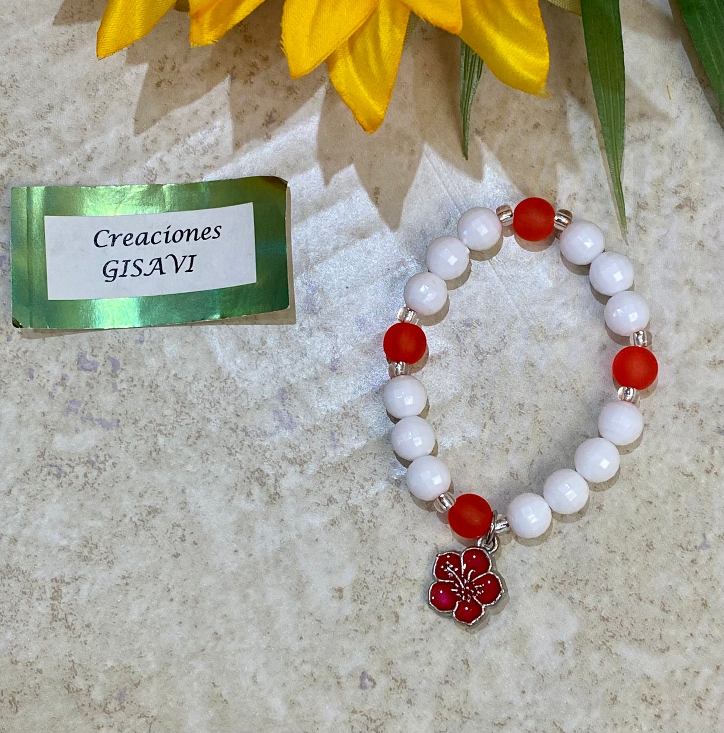 Small bracelet. White and red. Flower. 5.5”