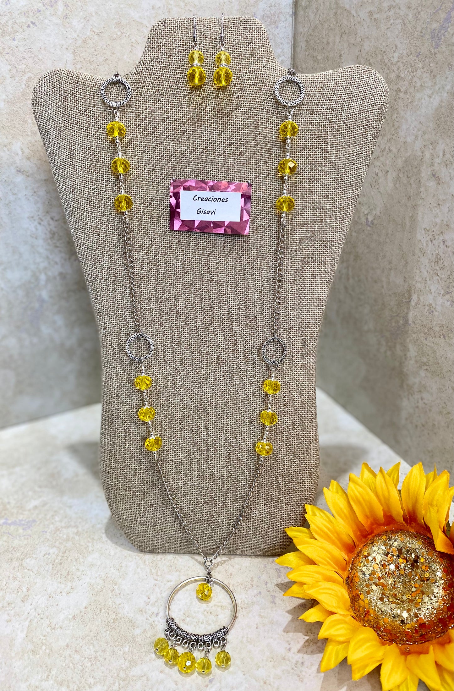 2019. Long necklace with yellow crystals